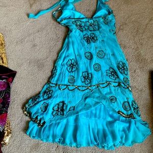 Gorgeous chiffon and intricate bead work. Halter, knee length